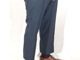 a man standing with his hands in his pockets