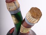 a wine bottle with two corks inside of it