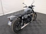 a motorcycle that is sitting on the floor in the room