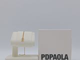 a white box with a watch on it next to a white box with a watch on it