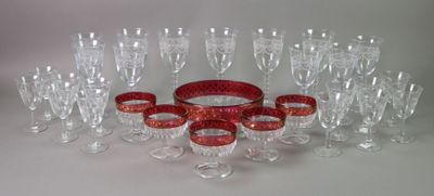 a lot of wine glasses that are sitting on a table