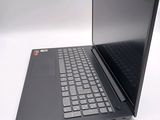 a laptop computer that is sitting on a white surface
