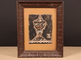 an image of a framed picture of a man with a hat on his head