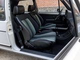 a small white car with two seats in the back