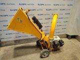 an image of a small machine that is sitting on the ground