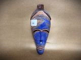 an image of a blue mask with a tag on it