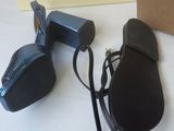 a pair of shoes and a blow dryer on a table