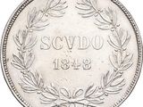a close up of a coin on a white background