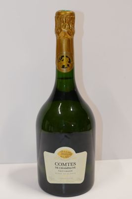 a bottle of champagne that is sitting on a table