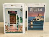 two boxes with a picture of a building on them
