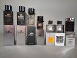 many different types of perfume bottles on a table