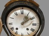 a clock that is sitting on top of a table