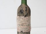 a bottle of wine that is sitting on a table