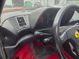 a dashboard of a car with a steering wheel and a dash board