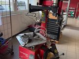 an image of a shop with a machine in the middle of the room