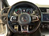 the interior of a car with a steering wheel and gauges