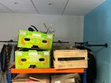 many boxes on a shelf in a room