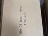 a box that is sitting on the floor next to a pile of boxes