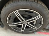 a close up of a tire on a car ' s rim