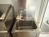 a sink and a sink in a small room