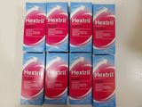 six boxes of hextrin tablets sitting on top of a table
