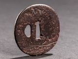 a coin with a hole in the middle of it