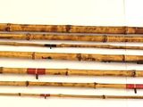 five different types of bamboo sticks on a white surface