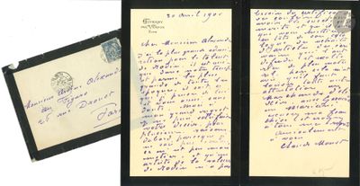 an old handwritten letter and envelope with a picture of a woman ' s face