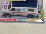 a toy ambulance with a barcode on the back of it
