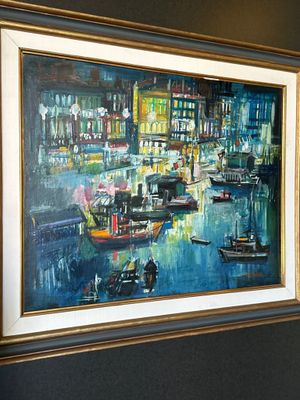 une image d'un tableau accroché au mur d'une pièce