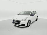 the small white car is parked in a white room