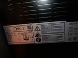 a close up of a sign on the side of a gas furnace