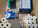 many rolls of toilet paper in a cardboard box
