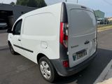 a white van parked on the side of the road
