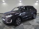 the new suzuki grand vitax is parked in the showroom