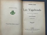 an open book with a picture of a crown on top of it