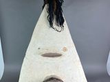an image of a wooden birdhouse with a bird ' s head on top