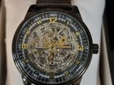 a watch that is sitting in a box on a table
