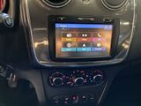 the dashboard of a car with a digital display in the center