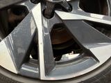 a close up of a car tire with a tire nut on it