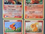 quatre cartes Pokémon aux couleurs et aux motifs variés