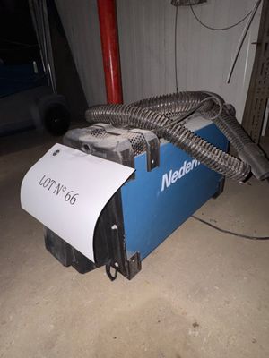 a machine that is sitting on the floor in the garage