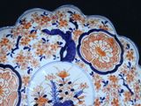 a plate with a blue and orange design on it