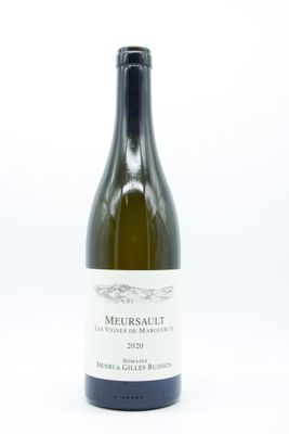 a bottle of wine that is sitting on a table