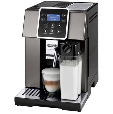 a coffee machine with a cup of milk on top of it