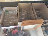many empty bottles in the box on the table