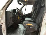 a white van with black seats and a brown seat belt
