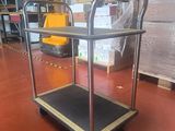 a cart that is sitting on the floor in a warehouse