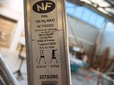 a picture of a close up of a metal object in a warehouse