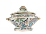 a small bowl with a lid that has a picture of a woman on it